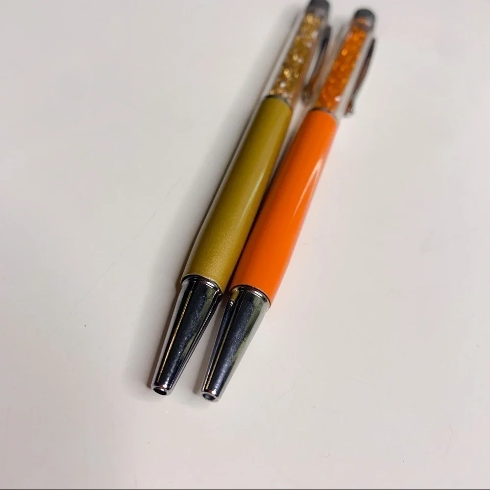 Two New Crystal filled stylus clip on pens black ink orange and gold
